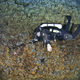 Illustration for article titled This Diver Is Cradling a 12,000-Year-Old Skull in an Underwater Cave